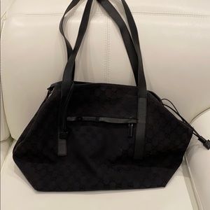 Old black Gucci bag heavily used lots of wear